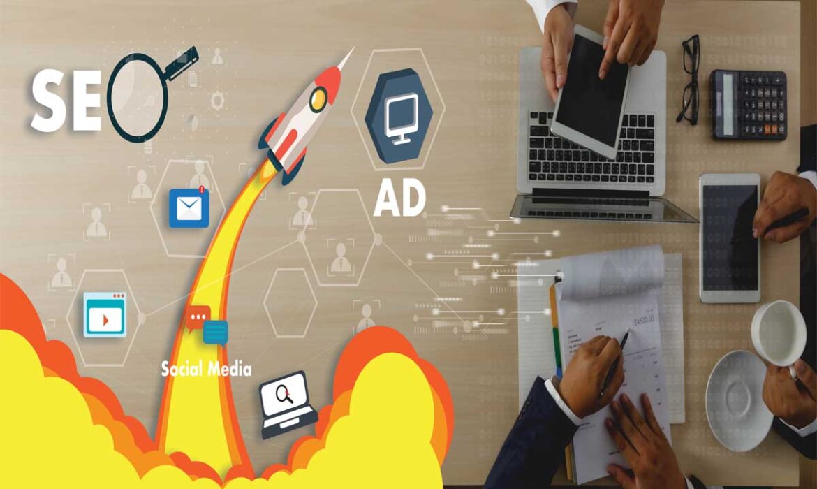 Team at a desk planning SEO and digital strategy with visuals of social media, email, and ads—representing crafted marketing ads in Dubai.
